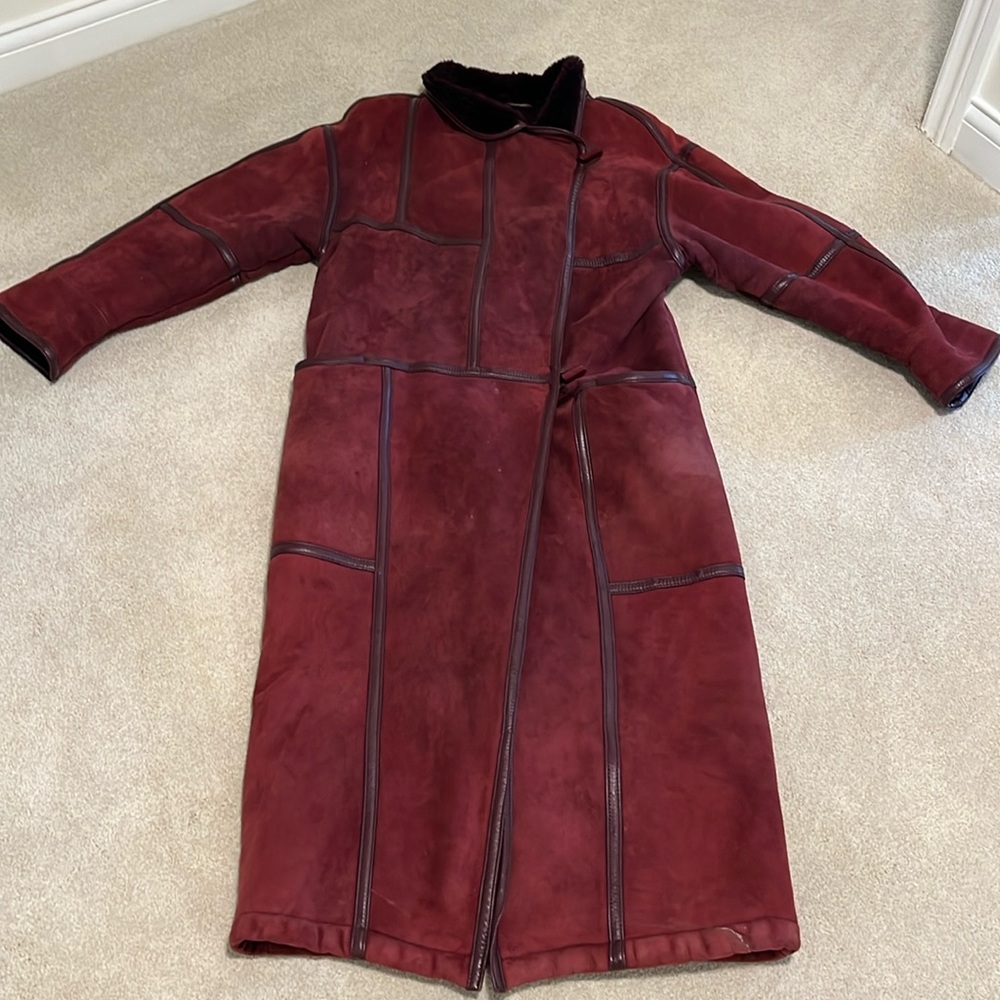 Very warm maroon long coat from Finland, used